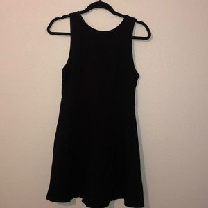 Black dress with skater skirt fit